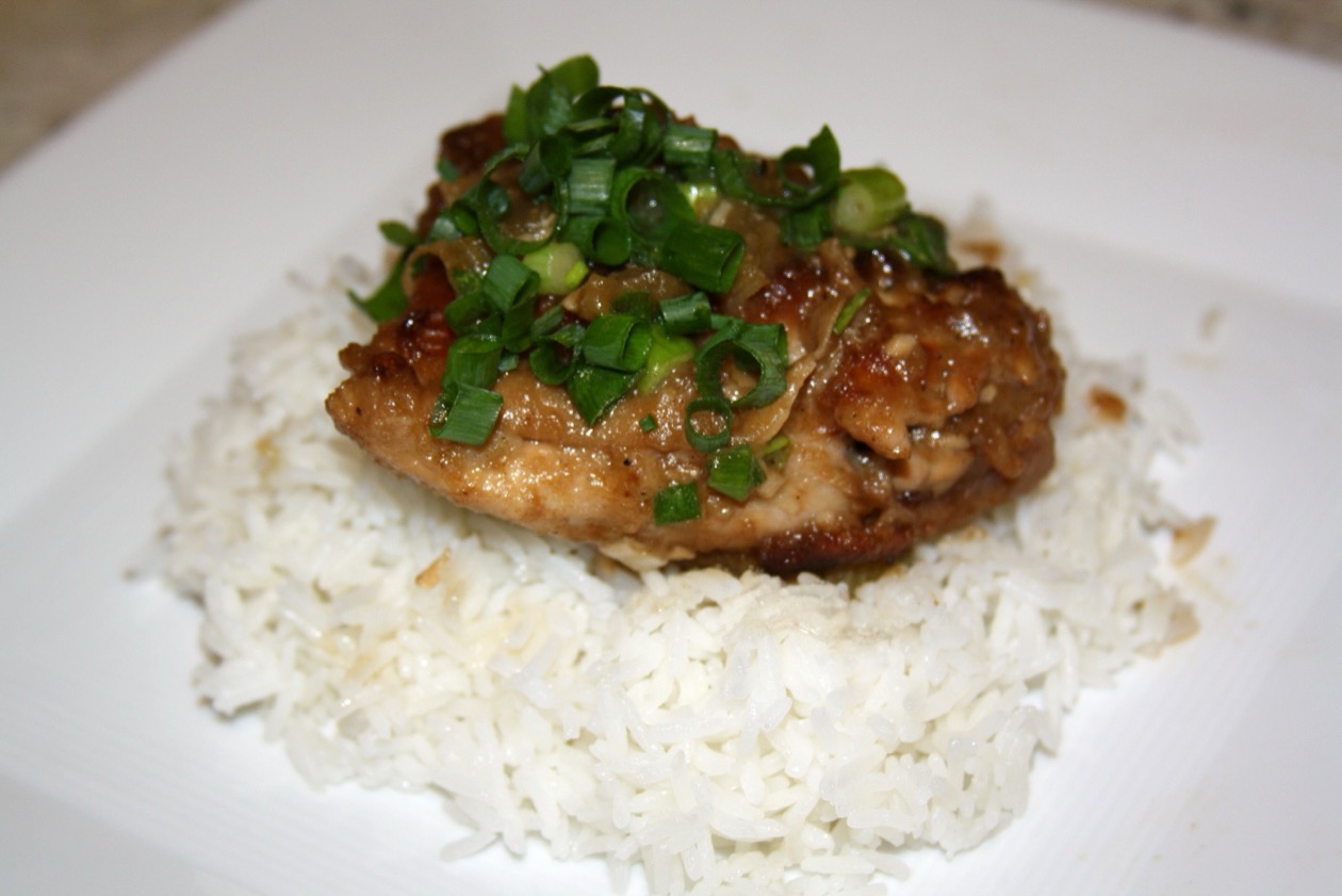 Filipino chicken adobo braised in soy-vinegar sauce served over rice