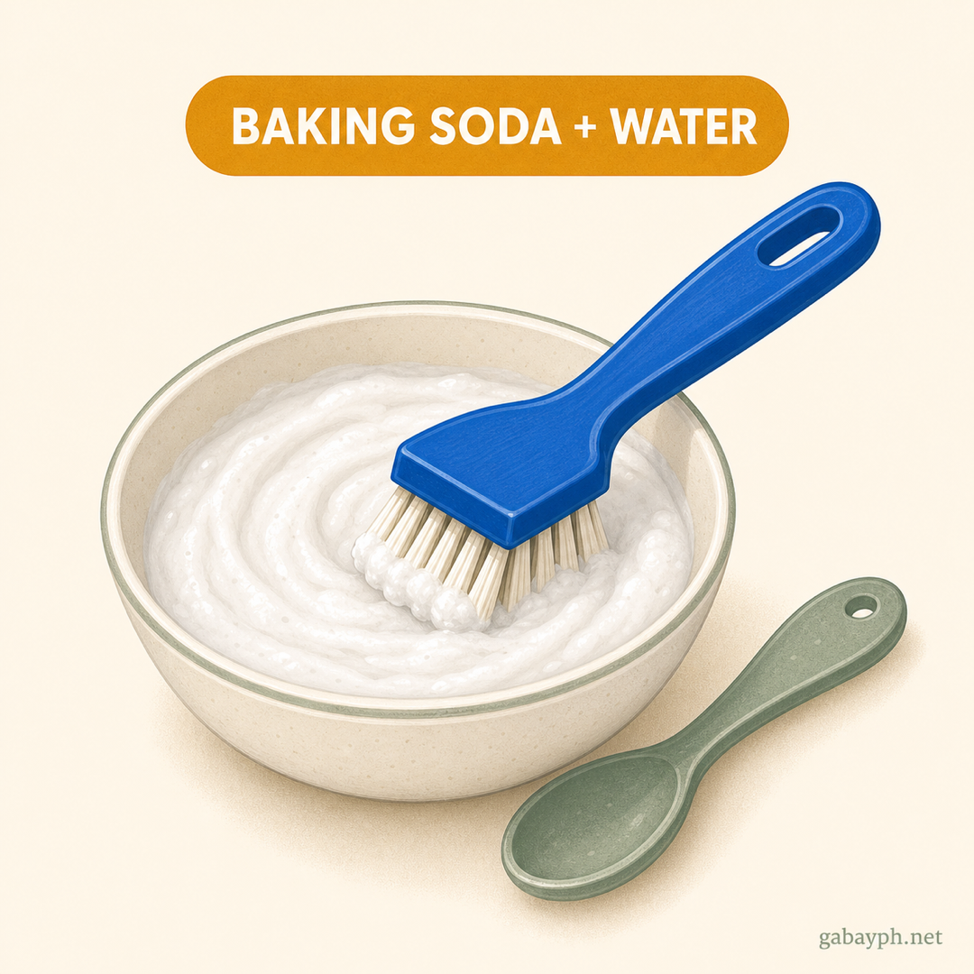 Bowl of baking-soda paste being mixed with a brush ready to apply