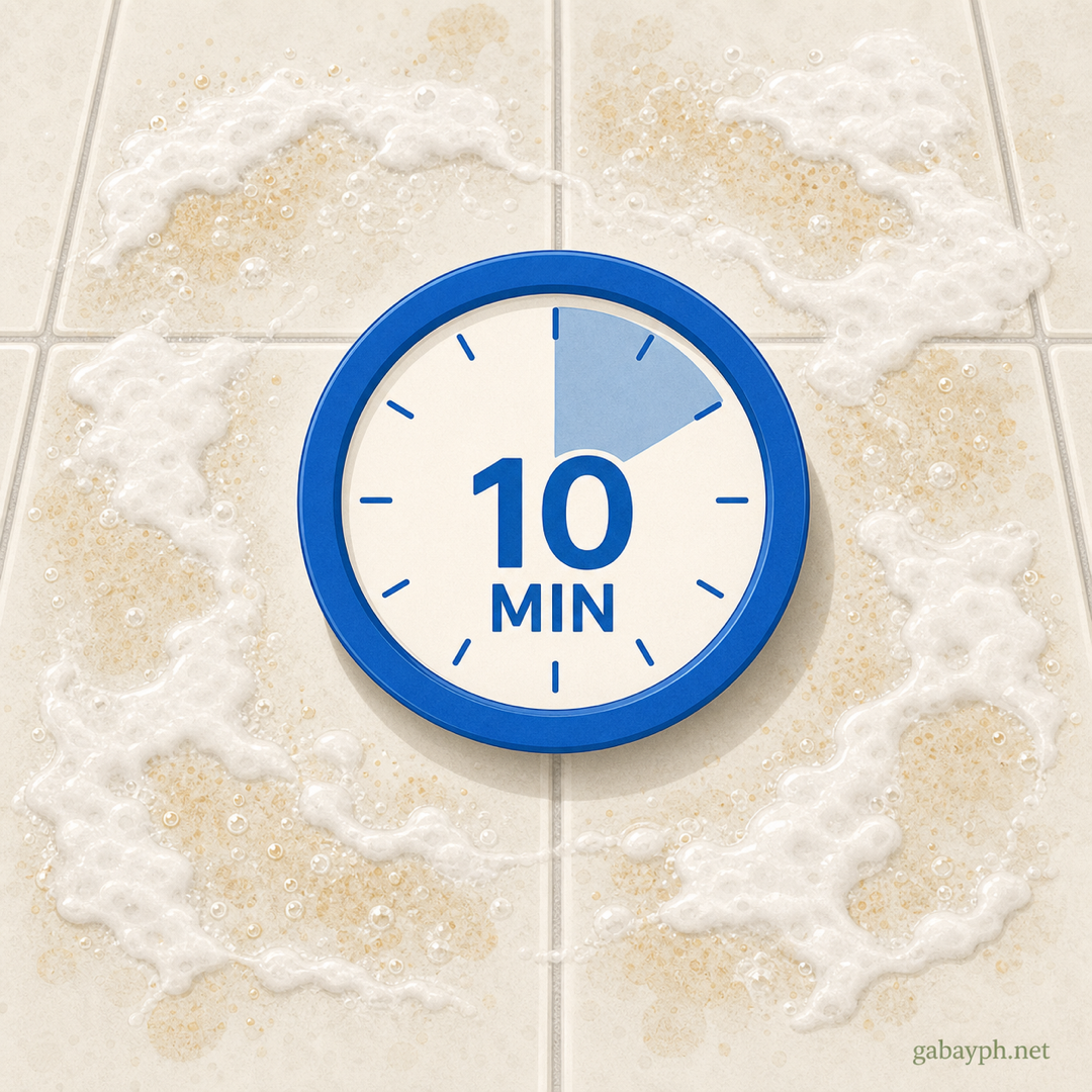 10-minute timer over paste-coated stained surface fizzing actively