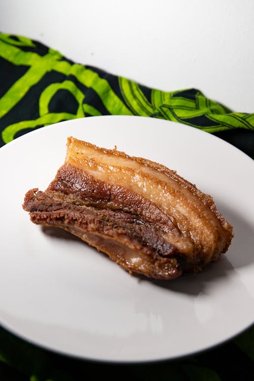 Crispy lechon kawali on a plate